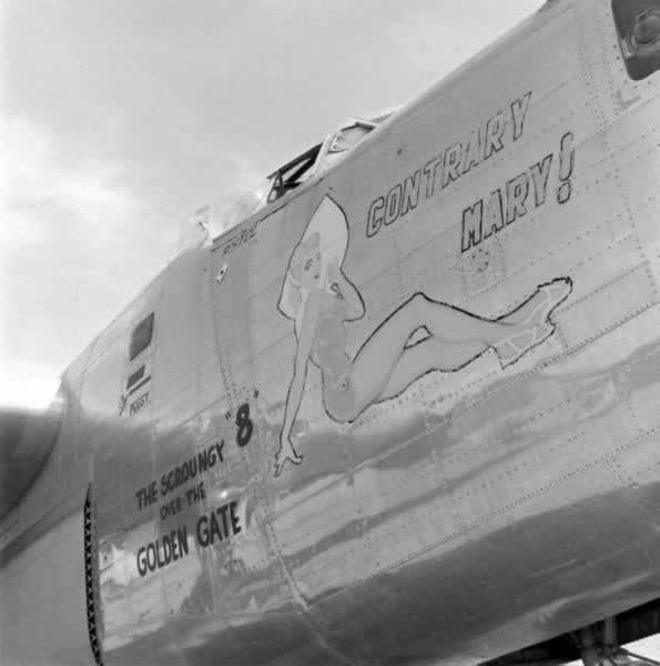 B-24 Liberator "Contrary Mary" ... "The Scroungy 8 Over the Golden Gate" awaiting the smelters at Kingman Army Air Field in Arizona